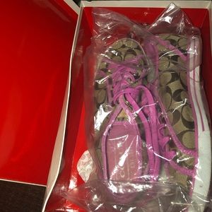 Pink and tan Coach signature sneakers